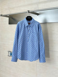 Blue Gucci long-sleeve button-up with allover logo pattern and pointed collar