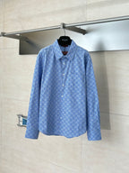 Blue Gucci long-sleeve button-up with allover logo pattern and pointed collar