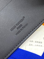 Blue leather wallet with embossed Louis Vuitton logo and made in France text