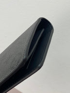 Small wallet bag close-up of interior opening with dark lining