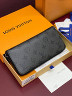 Small zip pouch with embossed monogram, black, slim long shape and zipper