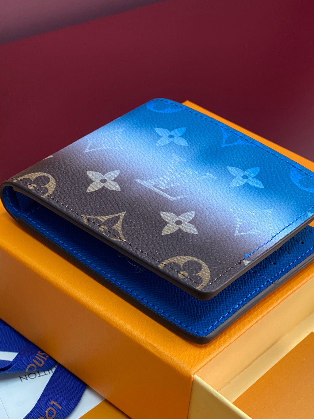 Blue and dark brown monogram small bag with top flap and blue interior