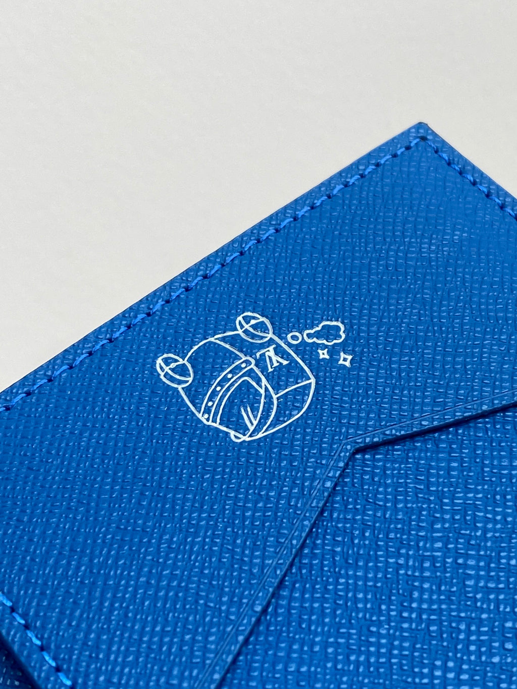 Louis Vuitton small bag front flap with embroidered line icon logo in blue