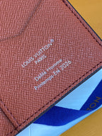 Louis Vuitton small wallet close-up of printed text on leather lining