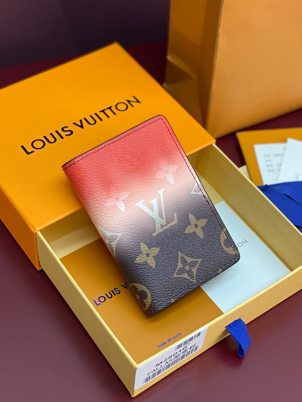 Louis Vuitton small bag wallet with red leather flap and monogram print