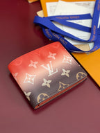 Small Louis Vuitton monogram card wallet with blue strap, red and dark brown