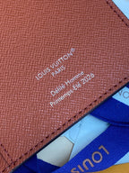 Brown leather Louis Vuitton small bag wallet with Louis Vuitton text print