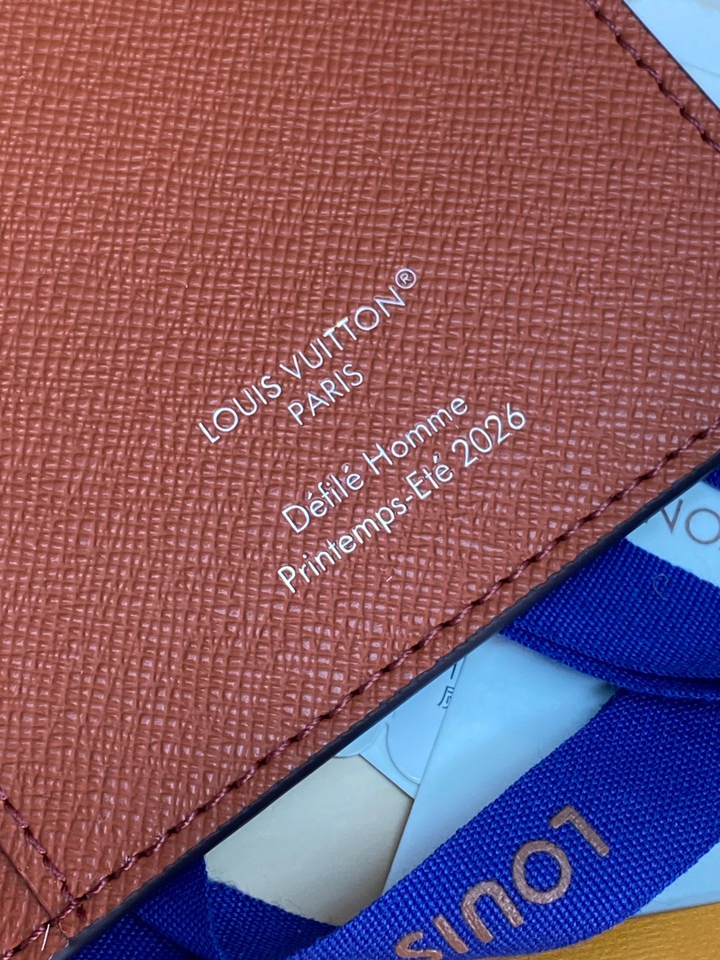 Brown leather Louis Vuitton small bag wallet with Louis Vuitton text print