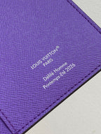 Purple small bag with Louis Vuitton Paris 'Delie Homme 2026' text