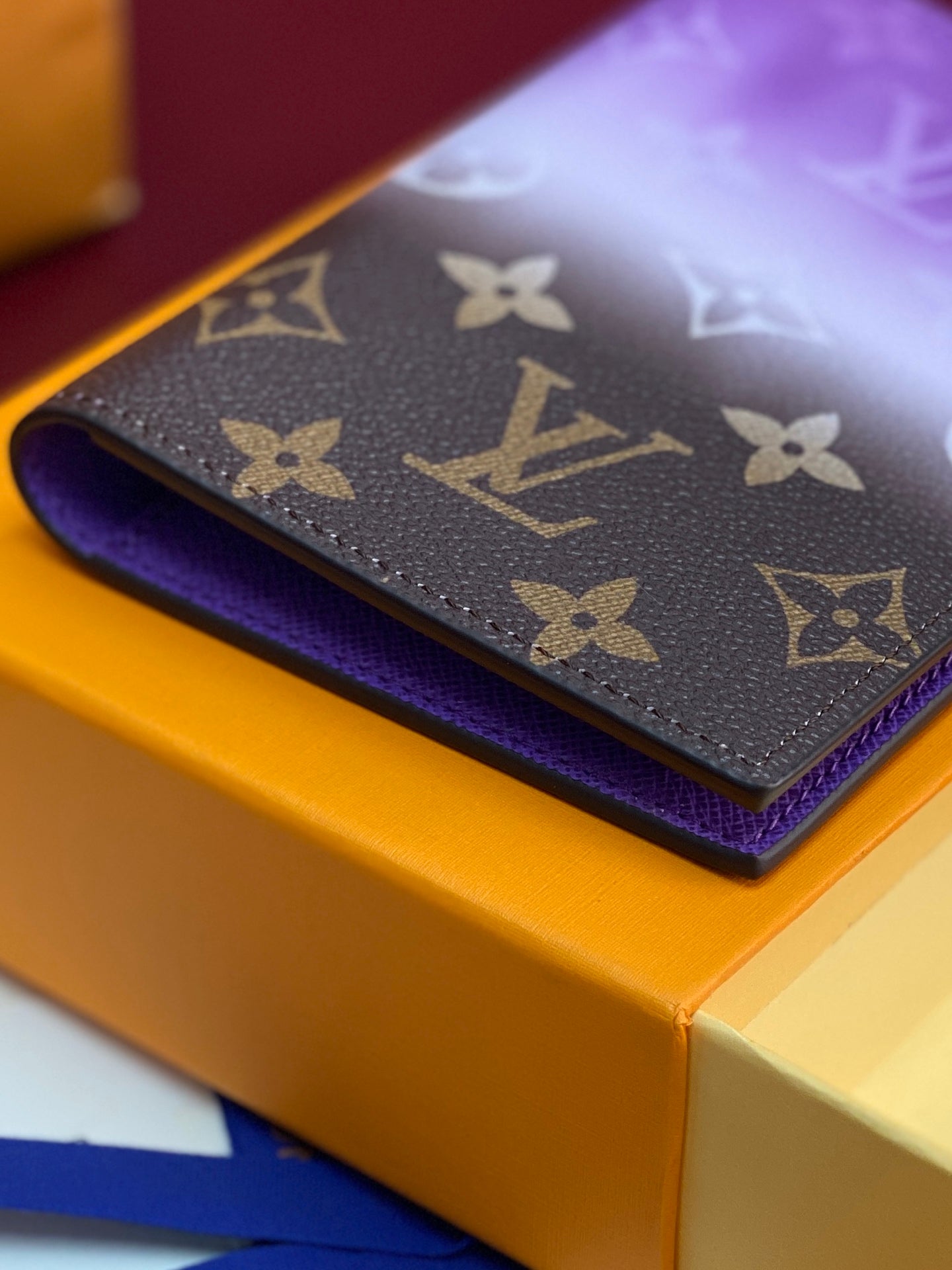 Purple small bag with Louis Vuitton monogram print and blue inner lining