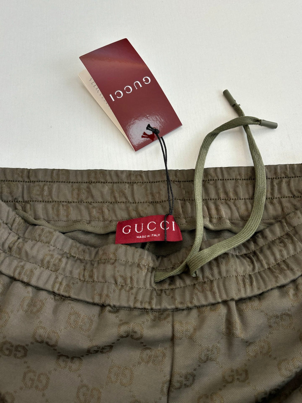 Gucci monogram shorts waistband with drawstring and logo label, dark olive