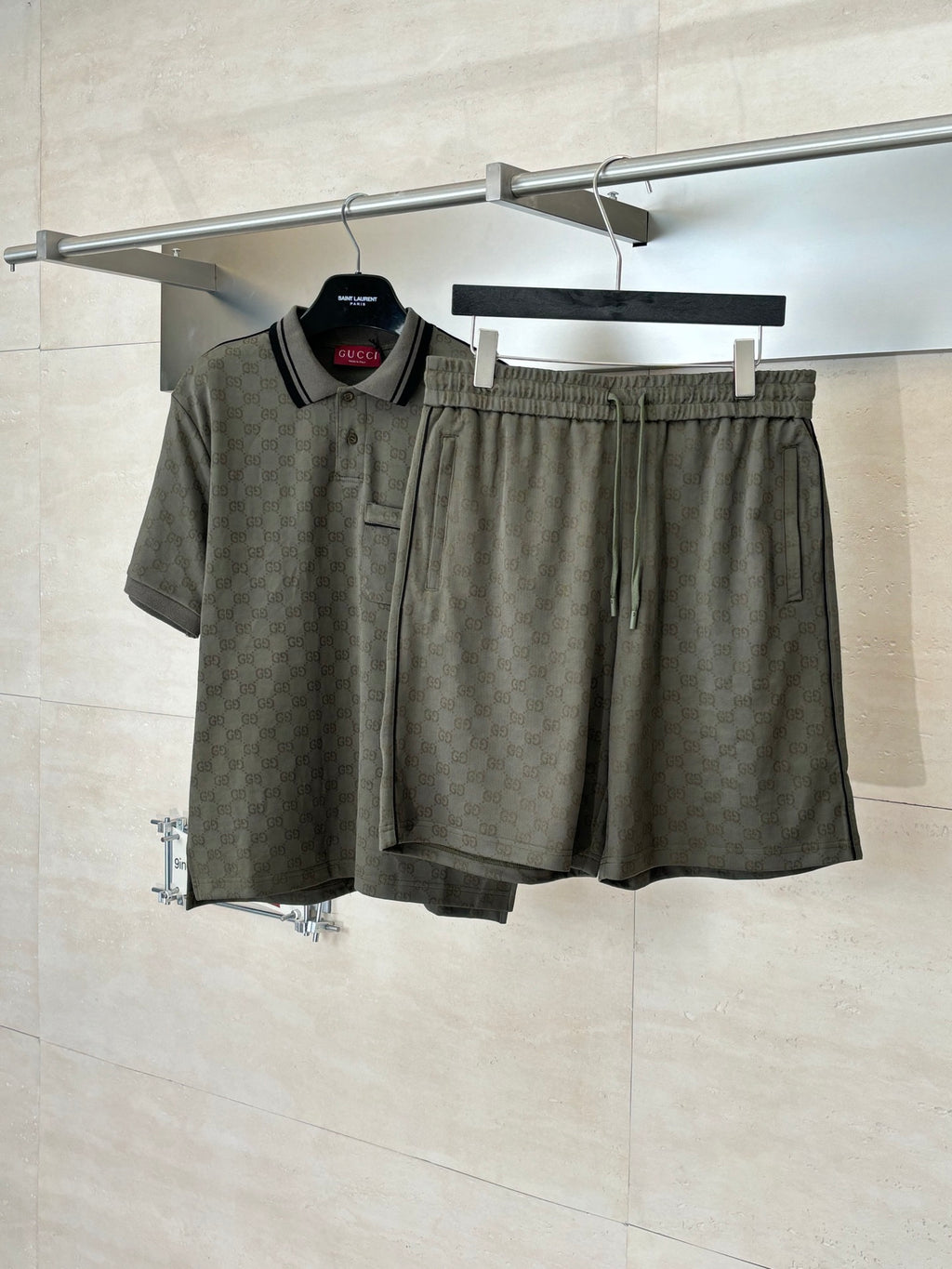 Gucci monogram shorts hanging on a hanger, elastic waist, dark olive