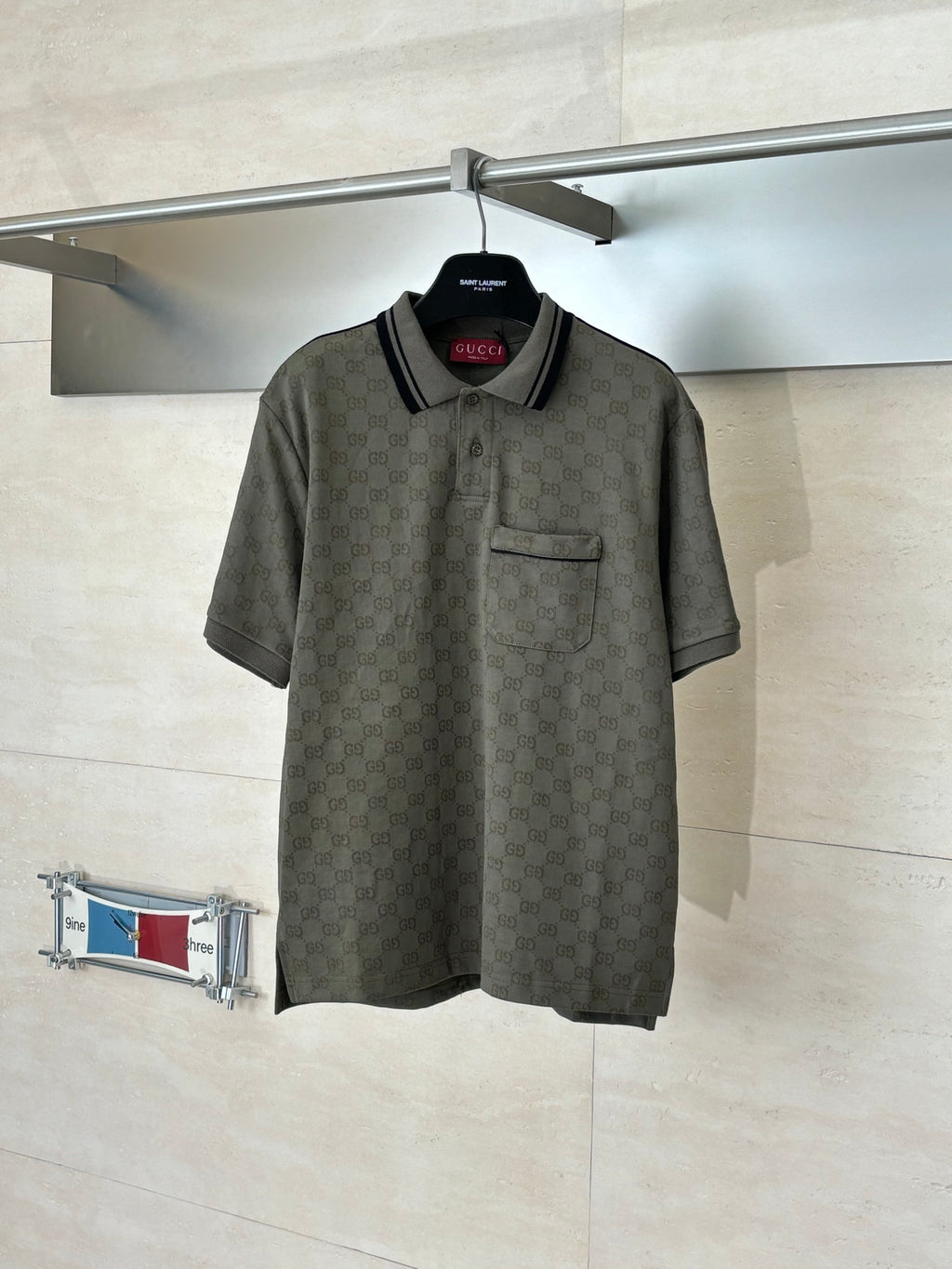 Gucci monogram short-sleeve polo shirt with black trim and chest pocket, dark olive