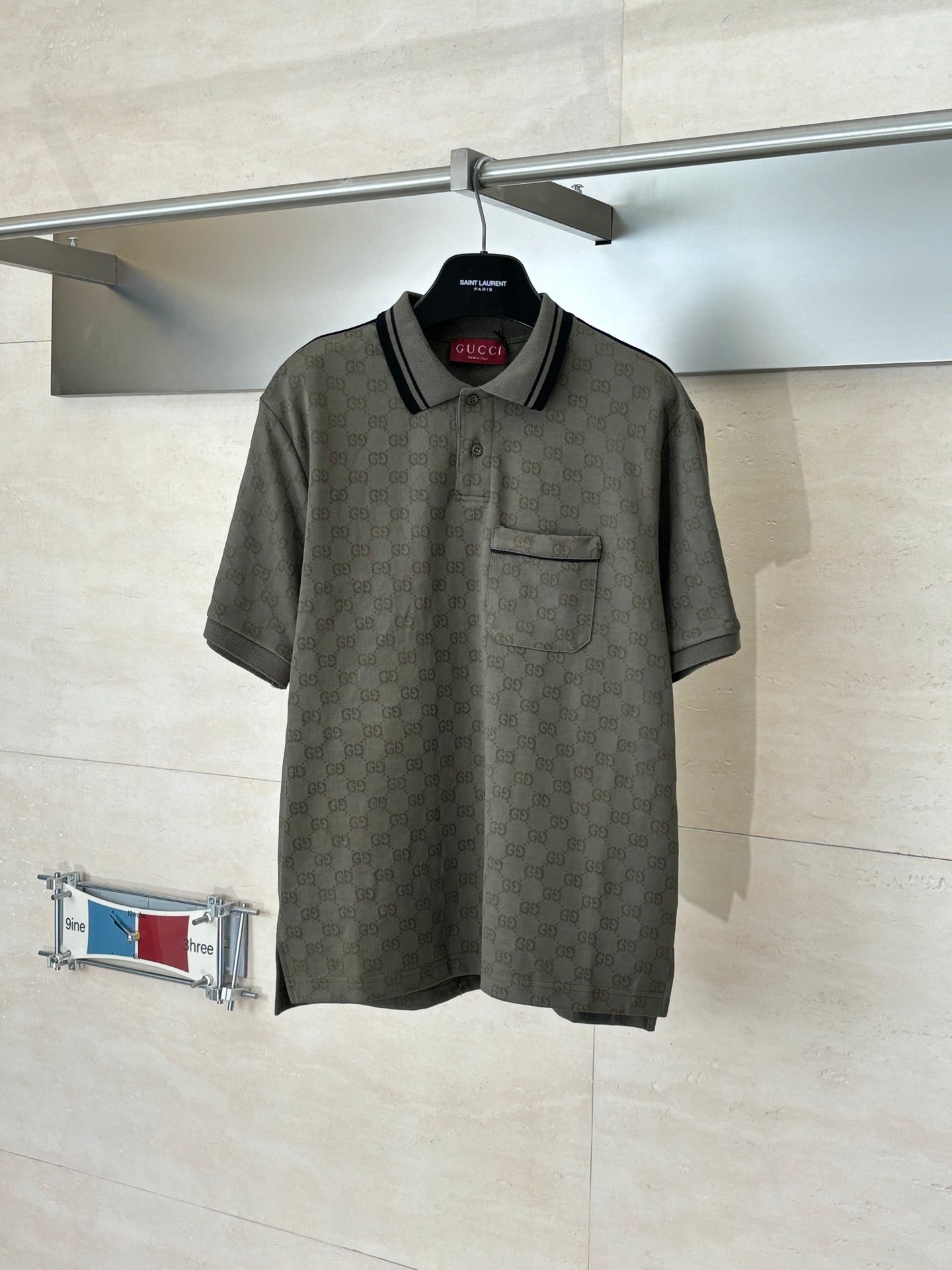 Gucci monogram short-sleeve polo shirt with black trim and chest pocket, dark olive