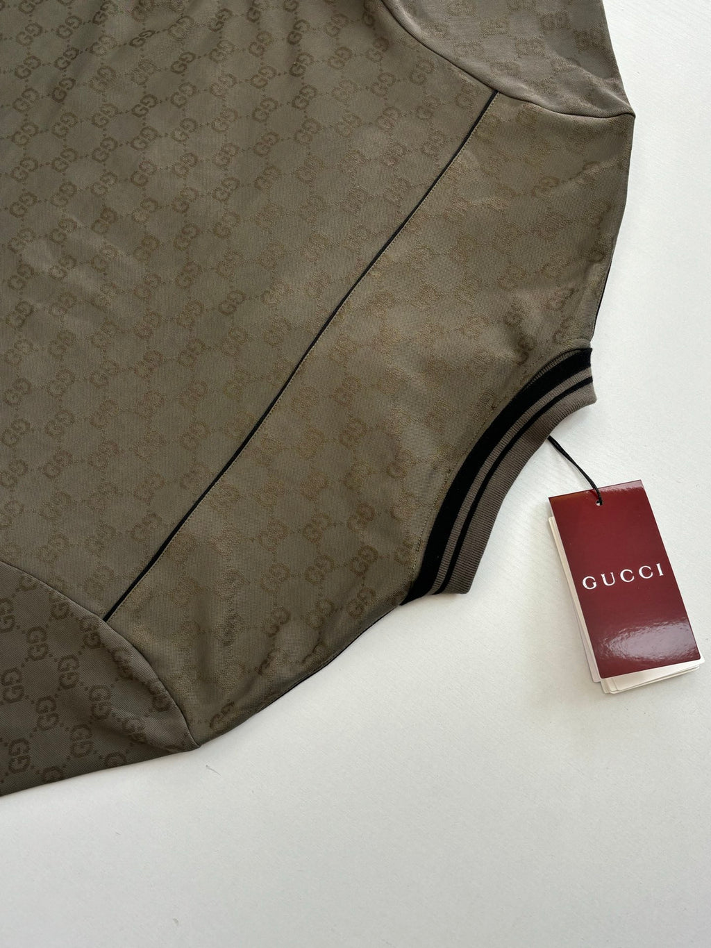 Gucci monogram polo shirt sleeve with black stripe trim, dark olive with hang tag