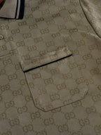 Gucci monogram polo shirt detail with chest pocket and buttons, dark olive