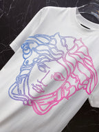 White T-shirt with blue and pink Medusa-style face graphic, crew neck.