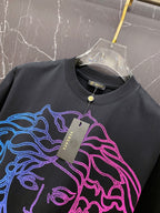 Black graphic T-shirt with neon Medusa line-art and hanging brand tag