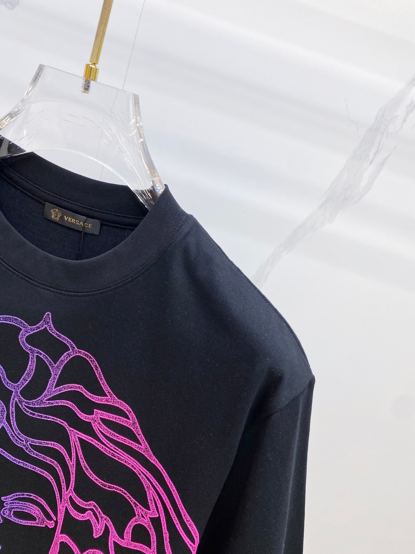 Versace T-shirt neckline and chest graphic in blue and purple line art