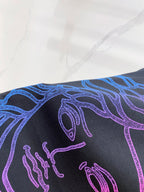 Versace T-shirt close-up of shoulder graphic in blue and purple on dark navy