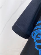 Versace T-shirt sleeve hem with blue and purple graphic detail