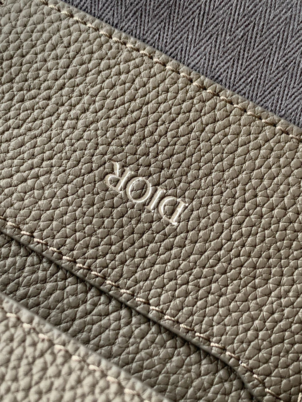 Taupe textured leather Dior stamp on small pouch bag