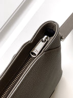 Taupe leather Dior men's small pouch bag zipper pull with CD charm