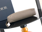 Taupe leather Dior men's small pouch bag with side strap loop and zipper
