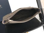 Taupe leather Dior men's small pouch bag open with black fabric lining