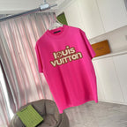 Louis Vuitton pink T-shirt, angled view with Louis Vuitton logo