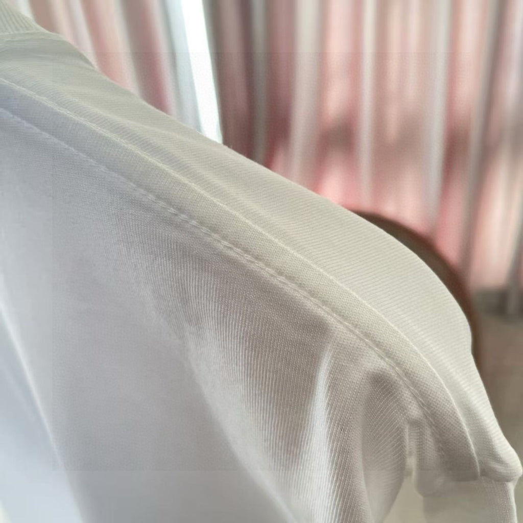 Louis Vuitton white T-shirt sleeve fabric texture with stitched seam