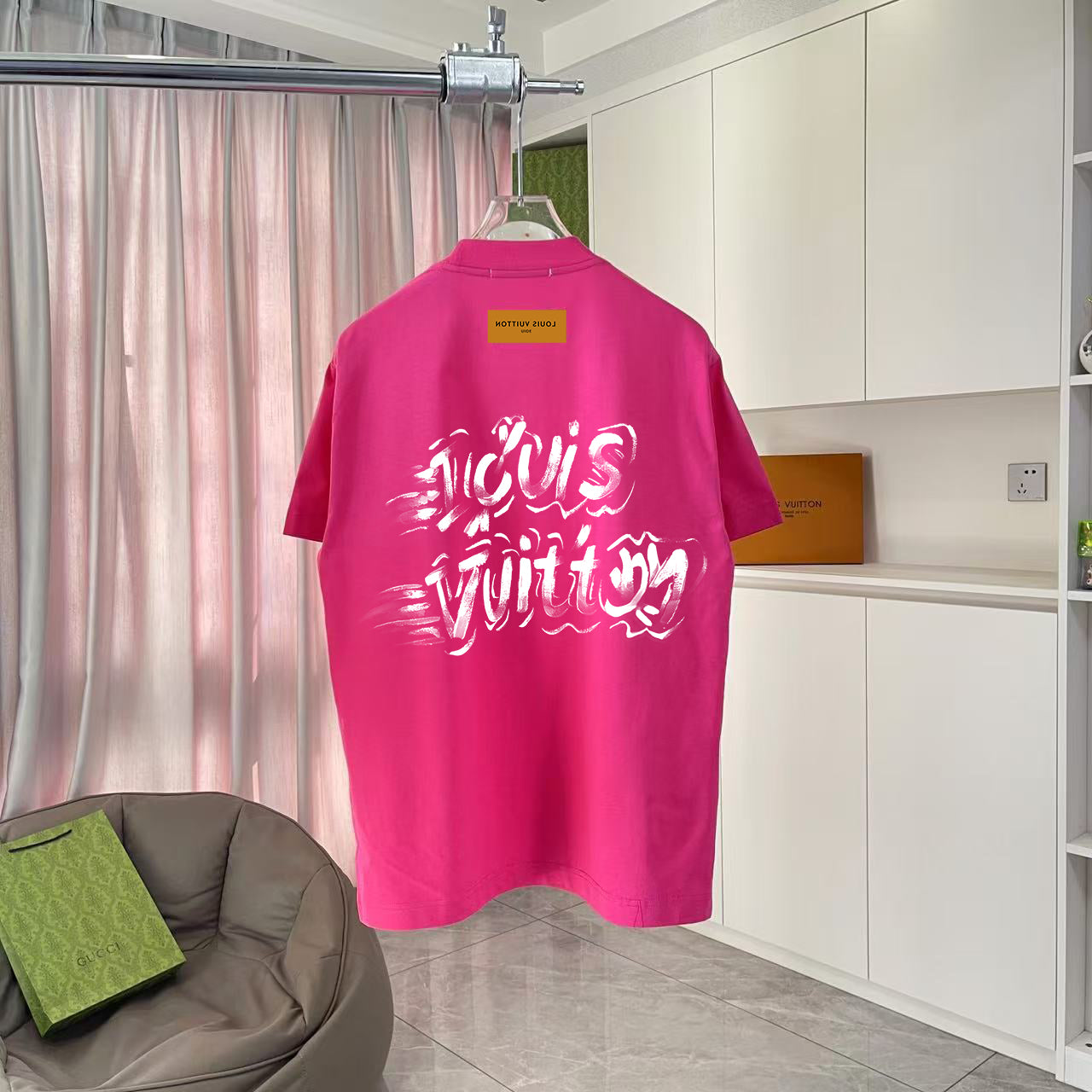 Louis Vuitton pink T-shirt back view with large white logo print
