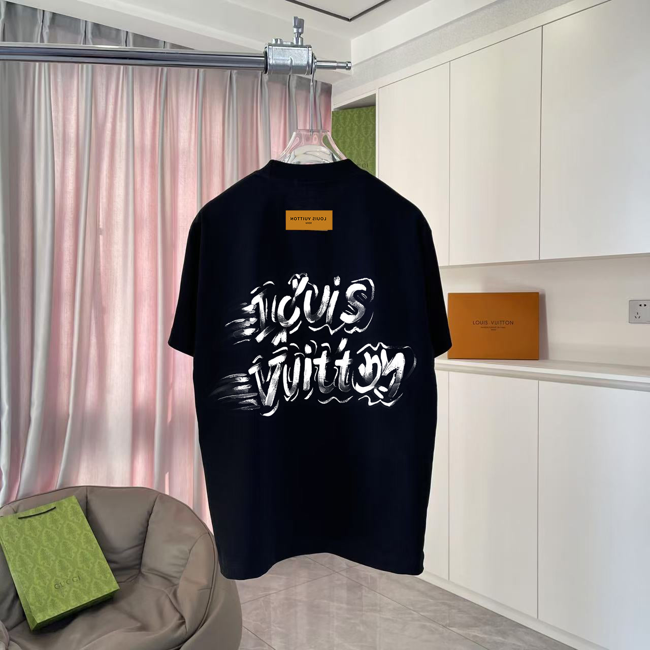 Black short-sleeve T-shirt with large white back graphic print