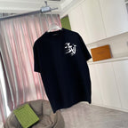 Black short-sleeve T-shirt with white chest graphic and crew neckline