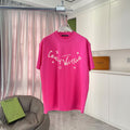 Louis Vuitton pink T-shirt with large front logo script and small LV symbols