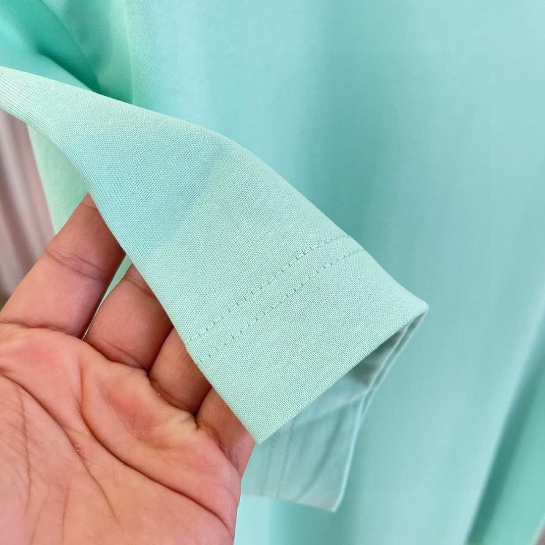 Louis Vuitton turquoise T-shirt cuff and sleeve hem stitching detail