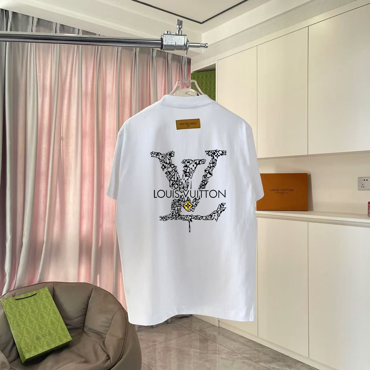 Louis Vuitton white T-shirt with large black logo graphic on back