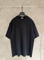 Black short-sleeve T-shirt with crew neck and embroidered graphic on chest.