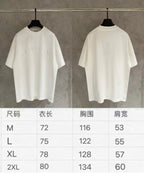 Two Dior white crew-neck short-sleeve T-shirts on hangers
