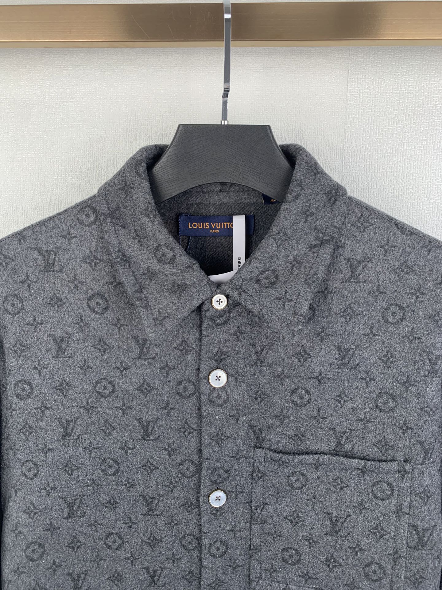 Dark gray monogram button-up shirt close-up of collar and chest pocket