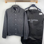 Monogram button-up shirt with chest pocket, dark gray fabric, and white snap buttons