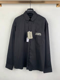 Long-sleeve button-up shirt, dark gray, front logo patch and button placket