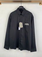 Long-sleeve button-up shirt, dark gray, front logo patch and button placket