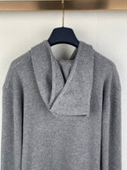Gray zip-up hoodie, close-up of hood and draped collar opening