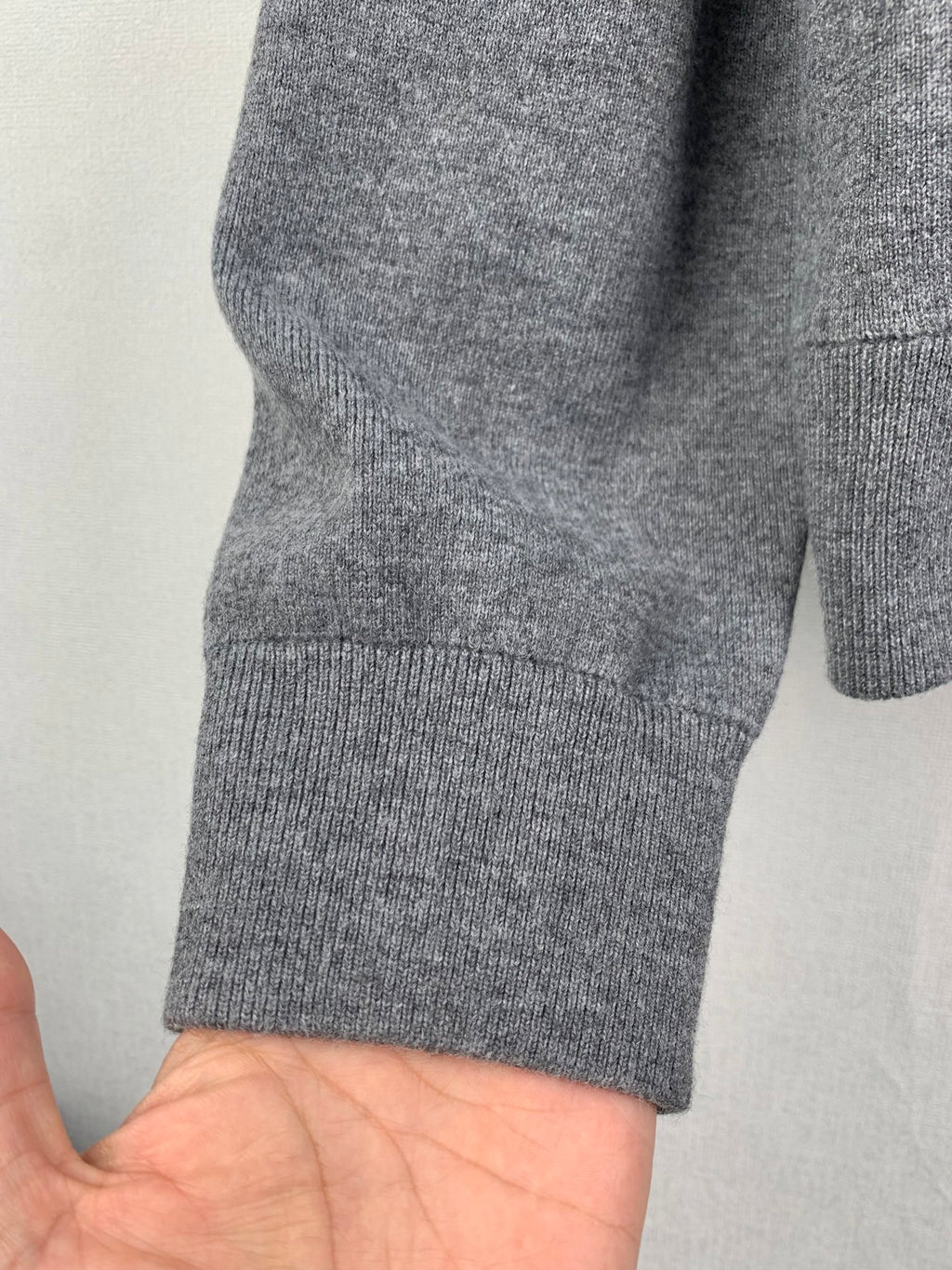 Gray hoodie cuff and ribbed hem, knit sleeve with seam detail