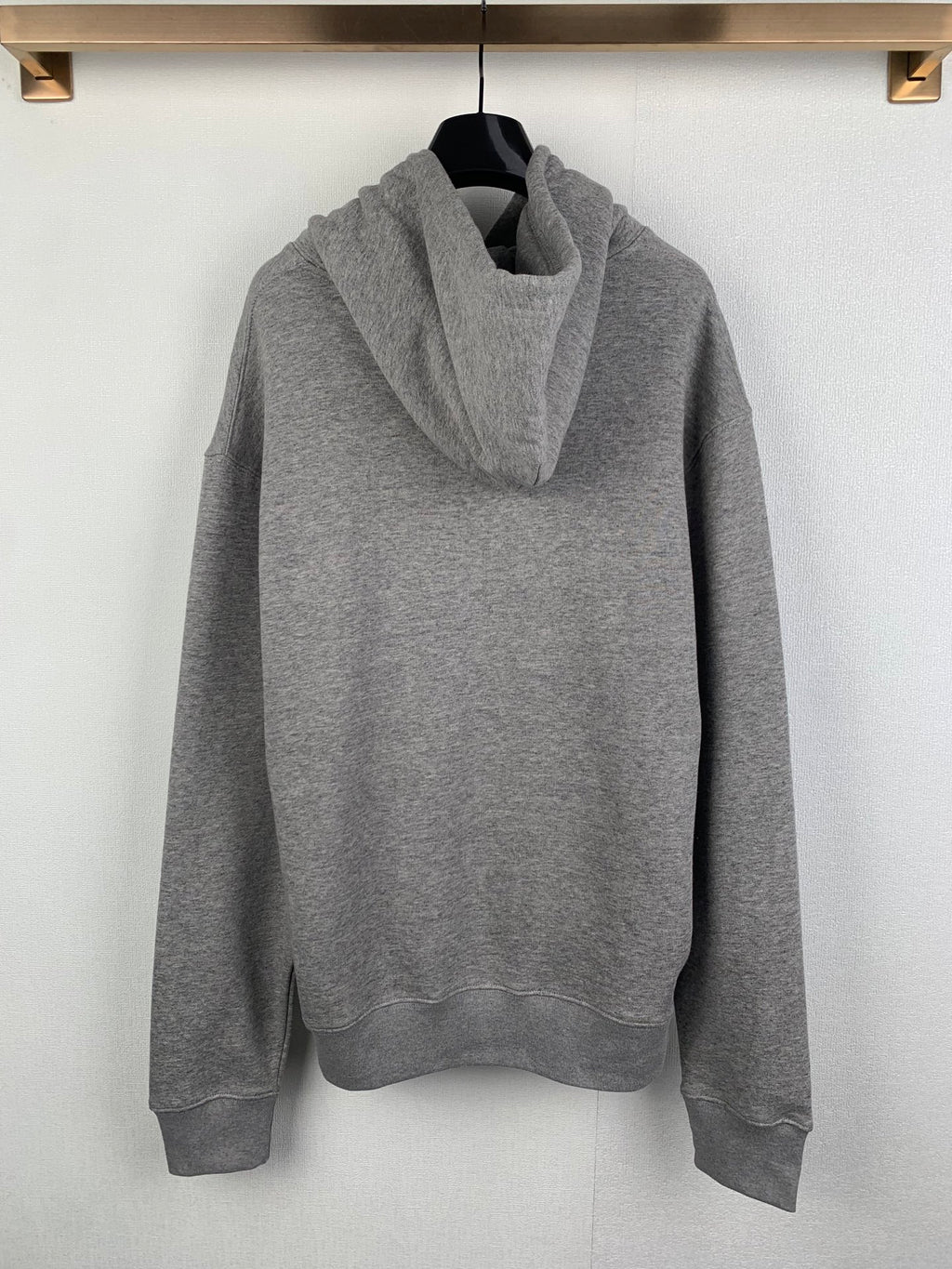 Gray hoodie with draped cowl hood, kangaroo pocket, long sleeves