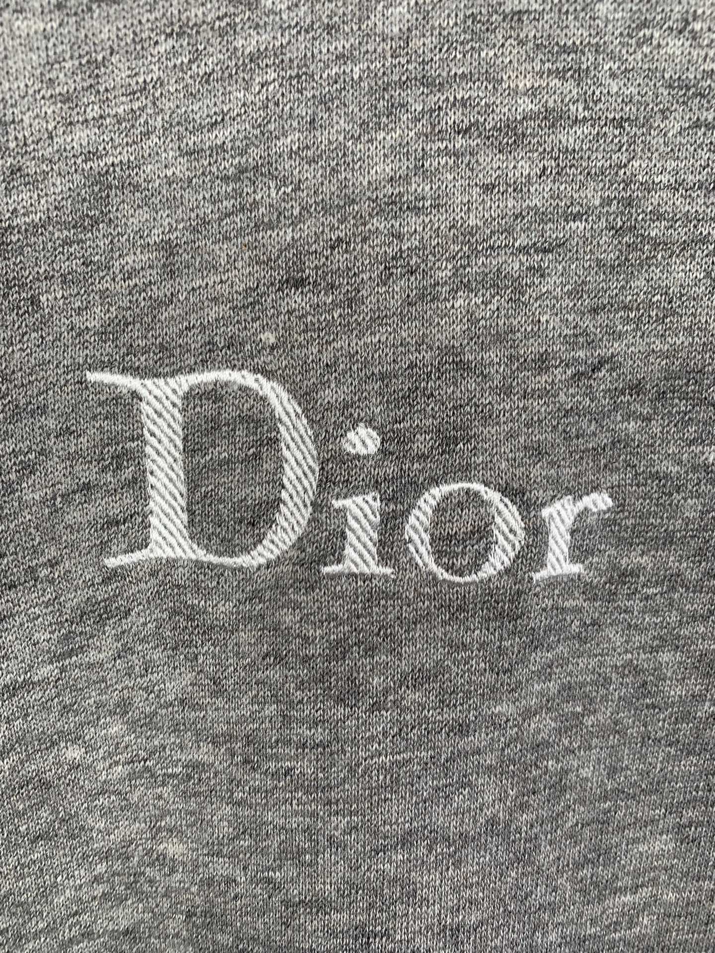 Gray heather hoodie fabric with white "Dior" logo