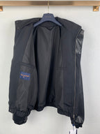 Louis Vuitton long jacket laid open on hanger, hooded interior and front zipper