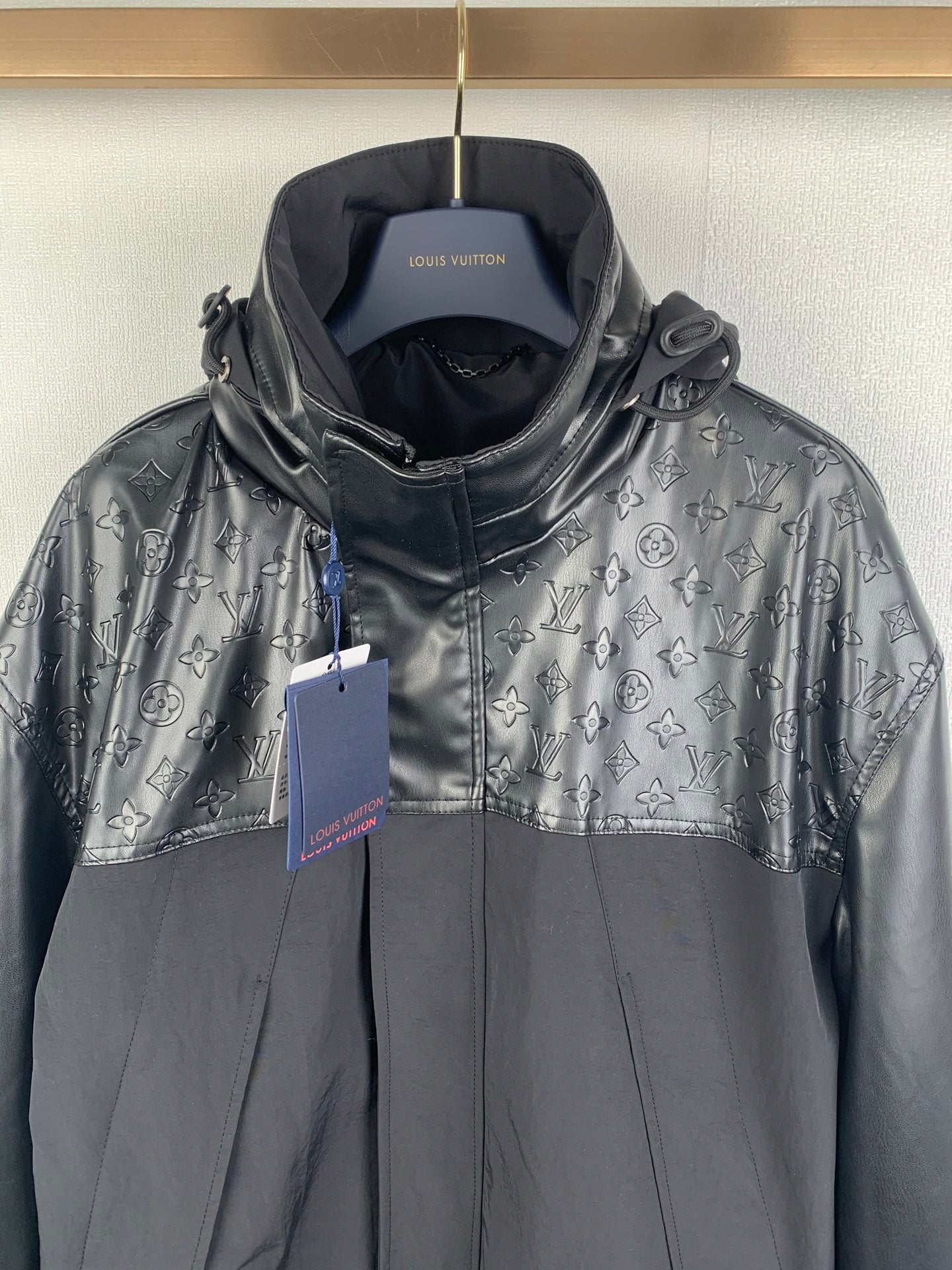 Louis Vuitton hooded long jacket with monogram logo pattern and front zipper