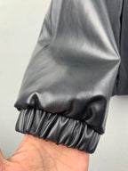 Louis Vuitton jacket sleeve cuff with gathered elastic and smooth dark finish